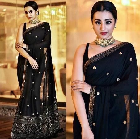 Shop Designer Partywear Black Saree With Golden Border Online at YOYO Fashion.  To Place Order , Call Or Whatsapp us on +91 8000588688  #yoyofashion #sareeofinstragram #sareelovers #sareefashion #sarees #sareestyle #sareelover #sareeindia #sareecollection #sareeaddict #sareeinspiration #sareeonline Black Sari, Bollywood Designer Sarees, Indian Sari Dress, Sari Design, Indian Saree Blouses Designs, Indian Fashion Saree, Saree Designs Party Wear, Black Saree, Saree Trends