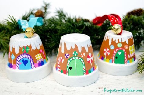 Transform mini terra cotta pots into the sweetest gingerbread house ornaments! Kids will love making this adorable Christmas craft to hang on the tree or give as a special gift. Potted Christmas Trees, Diy Christmas Ornaments Easy, Gingerbread Ornaments, Christmas Arts And Crafts, Fun Christmas Crafts, Clay Pot Crafts, House Ornaments, Kids Ornaments, Easy Christmas Diy