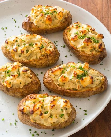 Cook's Country on Instagram: "Our Super-Stuffed Baked Potatoes are full of fluffy potato, garlic, herbs, and creamy cheese packed into a perfectly crisped potato-skin shell. Tap the link in bio to get the recipe."