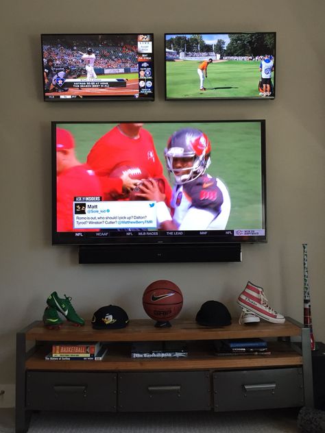 The ultimate multiple screen TV wall in his sports room. Man Cave Bar Diy, Tv Mounted, Recreational Room, Man Cave Basement, Man Cave Home Bar, Sports Room, Diy Bar, Man Cave Bar, Living Room Tv Wall