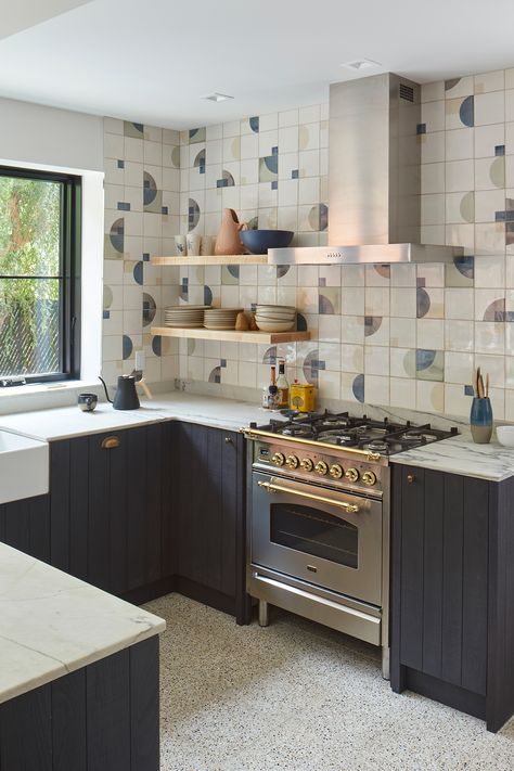 A vibrant tile pattern makes a statement in the kitchen of our Greenpoint project. Photo by Mikiko Kikuyama. Tile by Sminkthings. #architecture #interiordesign #nycarchitect #brooklyn #greenpoint #sminkthings White Marble Sink, Printed Tiles, Maple Floors, Natural Stone Flooring, Irregular Patterns, Marble Sinks, Dark Cabinets, Terracotta Tiles, Square Tile