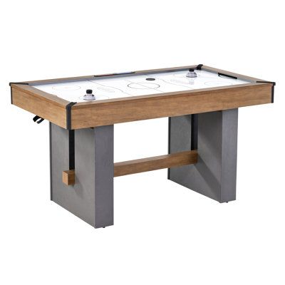 This Barrington Billiards Company 60'' 2 Player Aiir-Powered Hockey Table with electronic scorer and sound effects delivers big fun for the whole family while still fitting nicely in almost any size game room. The table has concrete-style legs and a connector bar for additional stability giving it a sturdy and attractive furniture look. With a 120V blower motor, airflow across the entire table is strong and consistent so you can enjoy the fun of fast air-powered hockey plays across a slick and s Urban Air, Air Hockey Tables, Hockey Table, Air Hockey Table, Room Furniture Design, Game Room Family, Air Hockey, Indoor Games, Rec Room