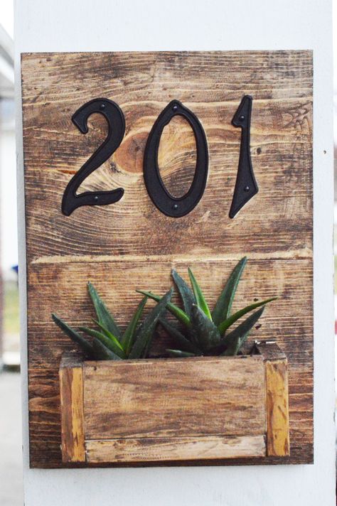 Dress up your porch with this easy rustic hanging planter box sign featuring your street numbers and succulents! Beginner project making a BIG impact!! Hanging Planter Boxes, House Numbers Diy, Diy Planter Box, Hanging Succulents, Astuces Diy, Front Porch Decorating, Succulent Garden, Diy Garden Projects, Planter Box