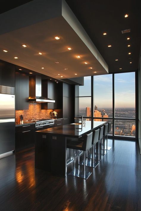 Sleek kitchen with high-rise city view. Uncover the secret sauce behind mind-boggling luxury penthouse designs that will have you fantasizing about living above it all. Luxury Penthouse Design, Luxury Penthouse Interior, Penthouse Kitchen, Luxury Modern Homes, Luxury Penthouse, Sleek Kitchen, Secret Sauce, Modern Interiors, Sky High