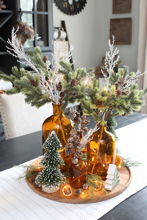 Amber Glass Christmas, Winter Table Centerpieces, Black Hutch, Diy Christmas Centerpiece, Christmas Dining Room Decor, Banquet Centerpieces, Woodland Christmas Decor, Christmas Orange, Diy Christmas Table