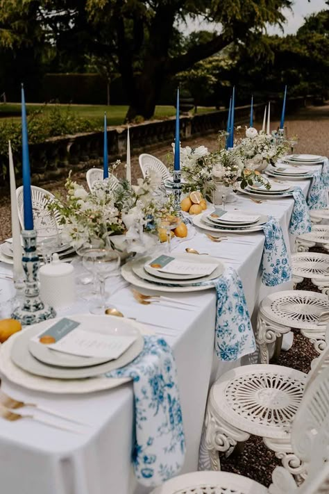 Italian Inspired Wedding Table Decorations with Lemons And A Blue Wedding Theme Blue Plates Table Setting Wedding, Italy Inspired Table Decor, Blue And Yellow Mediterranean Wedding, Blue And White Table Decorations Party, Blue White And Yellow Table Setting, Lemons Wedding Table, Mediterranean Wedding Decor Ideas, Mediterranean Blue Wedding Theme, Blue And White Lemon Theme