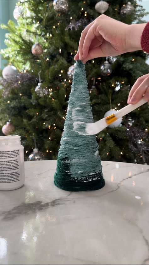 DIY Hollow Yarn Christmas Tree - Domestically Blissful Cone Yarn Trees, Green Yarn Christmas Crafts, Yarn Cone Trees Christmas Diy, Modge Podge Yarn Christmas Tree, Making Trees Out Of Paper Craft Ideas, Diy Christmas Tree With Yarn, How To Make Chunky Yarn Christmas Trees, Diy Christmas Tree Table Top, Cone Christmas Trees Diy How To Make