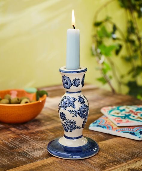 With a subtle Mediterranean feel, this gorgeous candlestick holder will always capture attention. Beautifully hand-painted, you’ll love how the flicker of a flame brings its blue florals to life. Sat on the mantelpiece, dining table or sideboard, it’ll catch the eye as soon as you step in the room. Blue Florals, Garden Candles, Blue Floral Pattern, Joe Browns, Candlestick Holders, Floral Painting, Sideboard, Blue Floral, The Room