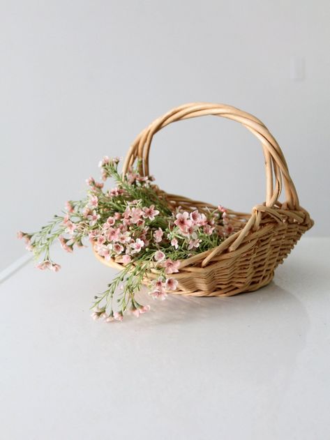 "This is a vintage gathering basket.  The braided wood handle basket is ideal for collecting your garden's harvest, for linen display in the home or as a catchall.  CONDITION In good condition with wear consistent with age and use.  MEASUREMENTS Height:  10.5\"  .. 26.7 cm Width:  14.5\"  ..  36.8 cm Depth:  10.5\"  .. 26.7 cm 52119" Basket Wedding Centerpieces, Basket Photography, Flowers Basket, Baskets With Flowers, Basket Wedding Decor, Flower Baskets Wedding, Basket Bouquet, Flowers In Baskets, Rattan Baskets