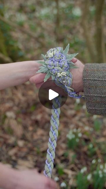 Ceotha | Handfasting Cords on Instagram: "Our Bloom Thistle design is a vibrant and symbolic  handfasting cord 💜  The thistle is well-known as Scotland’s national flower. They also have a longstanding association with nobility.   🌺 This artisanal handfasting cord features floral accents with #thistle leaves on a base of minimalist Celtic knot work.   🌷The Bloom knot is based on a Dara knot to echo the shape of a budding flower.  🌿The perfect cord to represent the current #season with nature in bloom!   💫This cord is customisable.   Shop it via the link in our bio (find it in our purple collection).  #handfastingcords #vibrant #happy #handfasting #handfastingceremony #handfastingcord #handfastingwedding #symbolism" Diy Handfasting Cord How To Make, How To Make Handfasting Cords, How To Braid A Handfasting Cord, Diy Celtic Handfasting Cord, Handfasting Cords Purple, Handfasting Cords, Thistle Design, Flower Bud, Wedding Mood Board