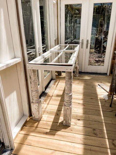 Did you know that we recently built a Greenhouse using reclaimed doors? Well, prior to finding the doors, I had started collecting windows to use for the project. Since we had a supply of windows on hand, we decided to use them to build a potting table for the Greenhouse. This is how we built our Easy DIY Potting Greenhouse Table basically for free. The entire table was built from salvaged and reclaimed materials that were left over from the greenhouse construction. You can see all th… Tables For Greenhouse, Greenhouse Workbench Diy, Window Tables Ideas, Diy Potting Table, Greenhouse Tables, Potting Area, Professor Plum, Greenhouse Benches, Diy Potting Bench