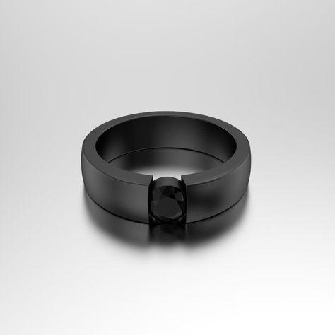 Impressive black zirconium engagement ring with a half carat black diamond.  Zirconium is a naturally grayish-white metal, much like titanium. Black zirconium is achieved by exposing the ring to extreme heat which causes the surface to oxidize and form a hard, black coating.  Ring Specifications: Gem: Black Diamond Number/Carat weight: 1 diamond, 0,50ct Ring band width: 5.5mm Ring band thickness: 1,7/3.3mm Material: Zirconium Choose something ultra-unique. Order this bold black ring for the styl Black Ring Wedding, Diamond Ring For Men, Zirconium Ring, Engagement Ring Black, Mens Black Ring, Wedding Band Black, Black Zirconium Ring, Black Diamond Engagement Ring, Black Engagement Ring