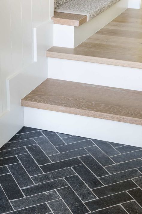 Step Flooring Ideas, Small Entrance Flooring Ideas, Herringbone Transition Floor, Herringbone Tile Hallway, Different Flooring In Different Rooms Transition, Tile Entryway Transition To Wood Stairs, Entrance Flooring, Limestone Herringbone Floor, Entryway Tiles To Wood Transition