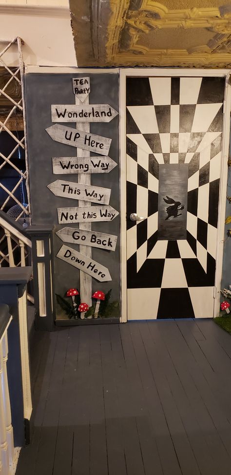 Diy Tim Burton Decor, Tim Burton Door Decorations, Tim Burton Diy Decoration, Alice In Wonderland Hallway, Alice In Wonderland Door Decoration, Alice In Wonderland Parking Spot, Alice Door, Alice In Wonderland Theme Room Decor, Alice In Wonderland Rabbit Hole Entrance