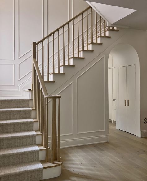 Stairwell Molding, Panelled Staircase, Spindle Staircase, Foyer Floors, Entryway Renovation, Jasmine Wall, Stairway Wainscoting, Stair Paneling, Interior Stair Railing