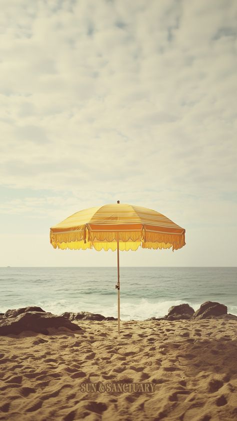 A yellow vintage style beach umbrella in the sand with ocean waves behind it. Beachy Vibes Aesthetic, Coastal Wallpaper Iphone, Wallpapers For Summer, Beautiful Phone Wallpapers, Beach Hammock, Coastal Aesthetic, Vintage Umbrella, Italian Village, Beachy Boho