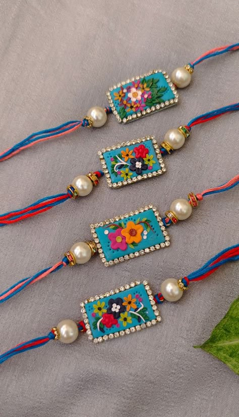 rura_creations@Instagram Polymer Clay Rakhi, Diy Rakhi Handmade Ideas, Clay Rakhi, Mouldit Clay Art, Crochet Rakhi, Cardboard Crafts Decoration, Diy Crafts Easy At Home, Rakhi Special, Handmade Rakhi Designs