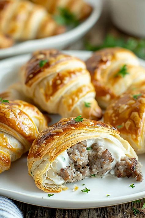 Creamy Sausage-Stuffed Crescent Rolls Sausage And Cheese Croissant, Sausage And Cream Cheese Croissants, Croissant Recipes Stuffed, Stuffed Croissant Recipe, Croissant Recipe Stuffed, Stuffed Crossiant Recipes, Crescent Roll Sausage, Sausage Cream Cheese Crescent Rolls, Stuffed Croissants