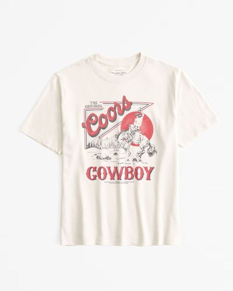 Women's Short-Sleeve Coors Light Graphic Relaxed Tee | Women's Tops | Abercrombie.com Coors Cowboy, Coors Banquet, Cowboy Graphic, Busch Light, Active Swimwear, Swimwear Suits, Coors Light, Top Graphic Tees, Suits Coats