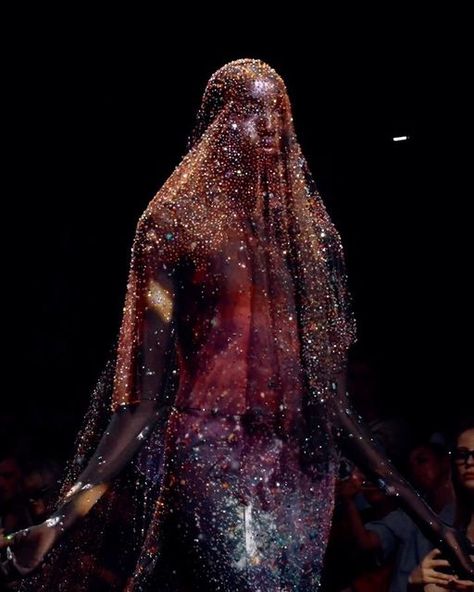 ROBERT WUN• on Instagram: "🪐The Soul Gown  The Closing Look of our FW24 Couture Collection. Consists of 97000 @swarovski crystals embroidery with a total of 1430 hours of hand work. A recreation of the Milky Way through couture craftsmanship, an interpretation of the search for soul within the stars.   Embodied by muse @nyauethriam   #robertwun •" The Soul Robert Wun, Robert Wun Soul Dress, Soul Dress Robert Wun, Robert Wun Soul, Robert Wun 2024, Robert Wun Couture, Swarovski Crystals Dress, Crystal Outfit, Crystal Clothing