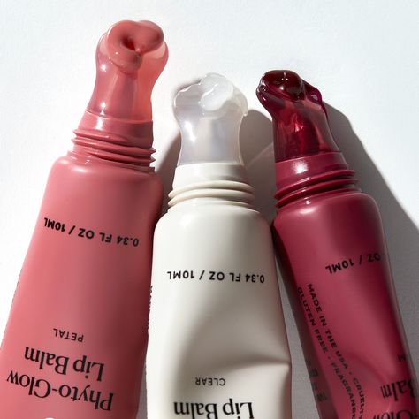 0.34 FL OZ / 10 ML Each Bundle & save with this trio of our most-loved balms on TikTok: Clear, Petal (sheer rosy nude) and Jam (sheer berry). Our intensely nourishing lip balm is formulated with phyto-derived esters, shea, cupuacu butter and plant squalane to cushion lips leaving them feeling silky, soft and smooth. Adds a glowy finish and beneficial moisture. In clear or tinted that adds a sheer wash of color. Note: Our Phyto-Glow Lip Balms contain natural vanilla flavor, which provides a subtl Glow Balm, Cupuacu Butter, Lip Set, Lip Hydration, Lip Glow, Lip Balms, Body Skin Care Routine, Natural Cosmetics, Cute Makeup