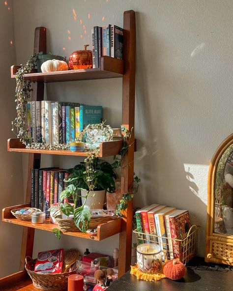 currently reading & watching 🧸☕️🍂🕯️ I felt like I needed some romance so I’m finally reading you, again 🧡 I added a bookshelf to my room & I wanted to show it off a bit. I’m not quite done styling it but it’ll do for now. Q: what is your fave fall movie? Brown Bookshelf Aesthetic, Bookshelf Decorating Ideas Living Room, Cottage Core Bookshelf, How To Style A Bookshelf, Books Bedroom, Brown Bookshelves, Bookshelf Inspo, Book Shelf Decor, Fall Movie