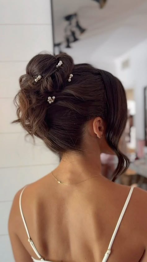 Instagram Bridesmaid Hair Styles Updo, Brown Hair Bridal Updo, Curly Bun For Prom, Wedding Updos For Long Hair Brunette, Brown Hair Bridal Hairstyles, Bridal Updo Brown Hair, Wedding Updo High Bun, Bridesmaid Hair Mid Length, Bridal Hairstyles Brunette