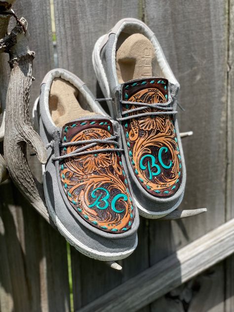 Custom Hand Tooled Herman Oak Leather with Sheridan Floral and Initials with a Turquoise Bucksitch on leather Hey Dude's shoes.  Hey Dude's Wally Men's and Wendy Women's come in whole size only. Please include Initials when ordering in message to seller.  This listing is for a Wally Men's shoe. Wendy Women's size available also. Message to order. Custom Leather Hey Dudes, Hey Dudes Mens Outfits, Leather Hey Dudes, Custom Hey Dudes, Handmade Leather Work, Western Shoes, Hey Dudes, Country Girls Outfits, Hey Dude