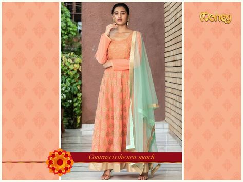 Super contrasting colours in pastel softened by light gold zari work. An exciting variety of Suits for Rakhi are showcasing across stores. Take a look here —>  https://www.manyavar.com/adorable-peach-suit-with-contrasting-blue-dupatta-SAS7225-412 Peach Colour Dress, Peach Suit, Peach Color Dress, Blue Dupatta, Blue Color Combinations, Peach Colour, Contrast Dress, Contrasting Colours, Dresses Indian