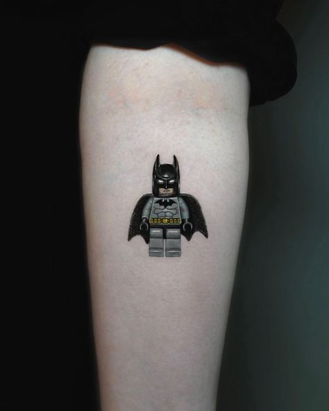 Cool Batman Tattoos, Black And White Marvel Tattoo, Batman Memorial Tattoo, Lego Batman Tattoo Ideas, Small Batman Tattoo Ideas, Batman Traditional Tattoo, Lego Figure Tattoo, Batman Leg Tattoo, The Boys Tattoo