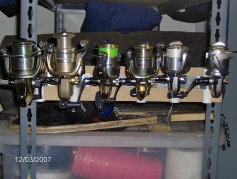 my D.I.Y reel holder - www.ifish.net Fishing Reel Storage, Fishing Room, Rod Holders, Fishing Stuff, Fishing Diy, Diy Garage Storage, Diy Holder, Rod Holder, Diy Garage