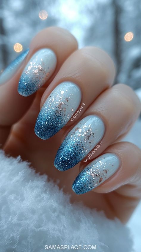 Kick off the New Year with 21+ stunning January nail ideas for 2025 that capture the essence of winter chic. From icy blue tones and snowflake designs to elegant metallics and shimmering glitter accents, these nails are perfect for celebrating in style. Explore cozy sweater textures, frosty ombré patterns, and minimalist geometric designs that suit every vibe—whether you're ringing in the New Year or embracing the calm of winter days. #JanuaryNails2025 #WinterNailArt #NewYearNailIdeas Powder Blue And Silver Nails, December To January Nails, Basic January Nails, Ice Blue Glitter Nails, Winter Nail Designs Light Blue, Snow Sparkle Nails, New Years Holiday Nails, Blue Christmas Nails Winter Sparkle, Blue Winter Sweater Nails