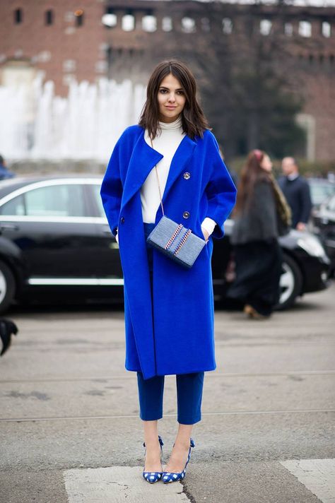 Street Style: Milan’s Rich Textures and Patterns - The Cut Royal Blue Coat Outfits For Women, Royal Blue Coat Outfit, Blue Coat Outfit, Blue Wardrobe, Coat Outfit Ideas, Royal Blue Coat, Neon Prom Dresses, Colorful Outfit, Below The Knee Dresses