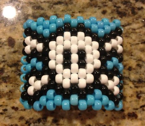 Skull and Crossbones Kandi Cuff Kandi Skull Pattern, Skull Kandi Cuff Pattern, Kandi Patterns Cuff, Rave Pictures, Pony Bead Jewelry, Scene Kandi, Kandi Cuff Patterns, Kandi Beads, Kandi Inspo