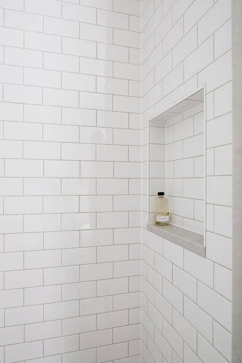 A Serene Bathroom Renovation - white subway tile with light gray grout Subway Tile Shower Niche Ideas, Subway Tile White Grout Bathroom, Light Gray Grout White Subway Tile, Best Lighting For Small Bathroom, Shower Niche Ideas Subway Tile, Subway Tiles Shower White, White Subway Tile Niche, Bathroom White Tile Grey Grout, Subway Tile Gray Grout Bathroom