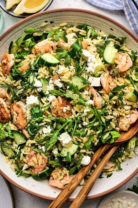 This orzo salad is made with shrimp, arugula, cucumber, herbs, feta, and a simple lemon dressing. This salad is light, fresh, and flavorful. Prawn Orzo Salad, Side Dishes For Shrimp, Shrimp Arugula, Shrimp Orzo Salad, Orzo Salads, Warm Weather Meals, Salads With Pasta, Recipes For Seafood, Two Peas And Their Pod