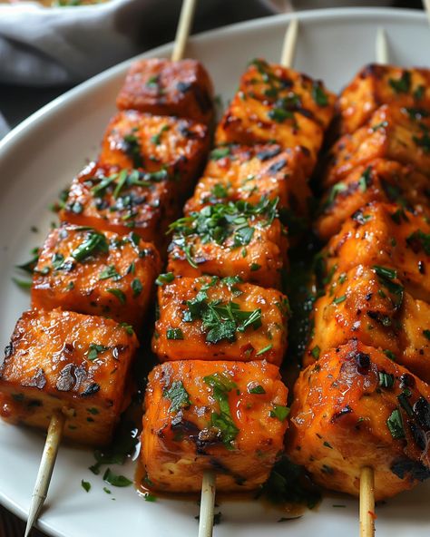 Vegan Tandoori Tofu Skewers🍢 Double marinated!👀 Follow @plantiful.palate for more recipes🗒️ Recipe: Ingredients: - Tofu skewers: - 400g firm tofu - skewers - 2 tbsp olive oil - 1st marinade: - 1/2 cup soy yoghurt - 1 tbsp lemon juice - 1 tsp salt - 1 tsp turmeric powder - 2nd marinade: - 1/2 cup soy yoghurt - 2 tbsp lemon juice - 2 tbsp tandoori masala - 1 tbsp garlic paste - 1 tbsp ginger paste - 1 tbsp vegetable oil - 1 tsp chilli powder - 1 tsp ground cumin - 1 tsp gro... Vegan Tandoori, Tandoori Tofu, Skewers On The Grill, Tofu Skewers, Tofu Cubes, Ginger Paste, Firm Tofu, Marinated Tofu, Tandoori Masala