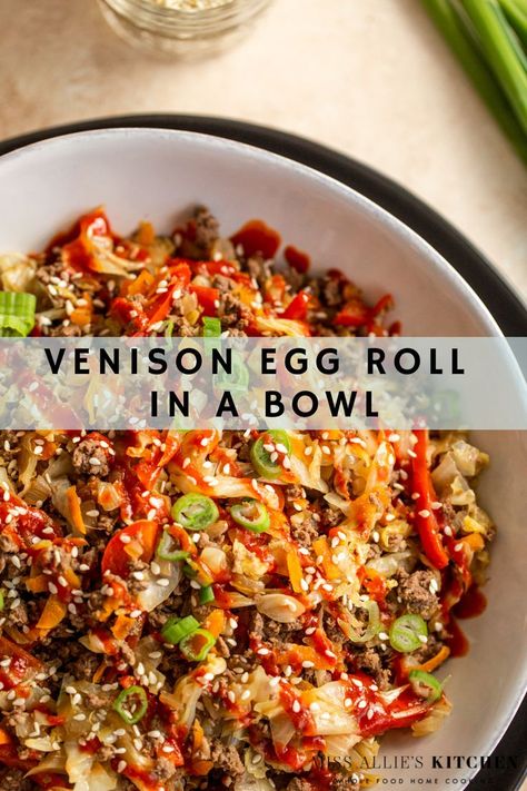 Bowl of venison egg roll in a bowl topped with sesame seeds, sriracha and green onions Elk Meat Recipes, Egg Roll Bowl, Ground Venison Recipes, Elk Recipes, Deer Recipes, Egg Roll In A Bowl, Deer Meat Recipes, Healthy Meat Recipes, Deer Meat