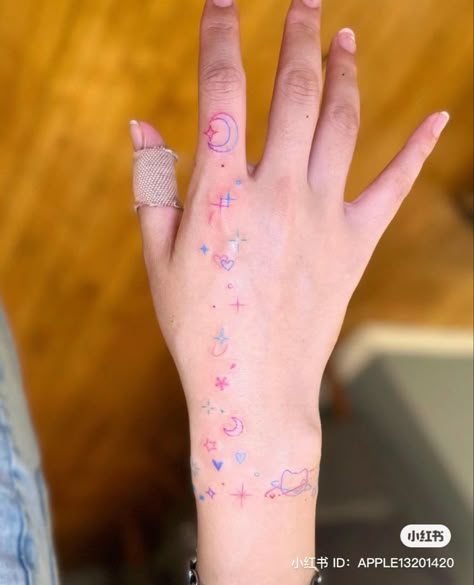 Colourful Hand Tattoo, Colored Simple Tattoos, Cute Colour Tattoo, Colorful Sparkle Tattoo, Colored Hand Tattoos, Hand Tattoos Color, Pink Hand Tattoo, Cute Colored Tattoos, Colorful Small Tattoos