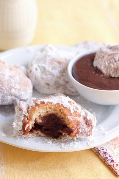 5 Best Jelly Donut Recipes Filled Beignets, Chocolate Dipping, Beignet Recipe, Chocolate Dipping Sauce, Chocolate Filling, Beignets, Sweet Treat, Powdered Sugar, Dipping Sauce