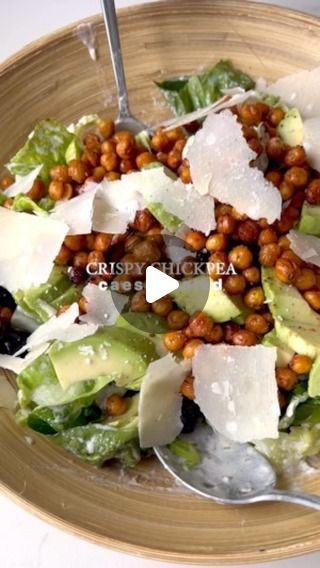 Elizabeth (Lilly) Assender on Instagram: "Crispy Chickpea Caesar Salad 

If you want a veggie caesar salad which is extra crunchy then give this a try ☺️

Ingredients 
1 x tin of chickpeas, drain and patted dry 
Olive oil 
Paprika
Garlic granules 
salt and pepper 

caesar dressing 
3 tbsps greek yogurt , I used @fage_uk 
1 tbsp finely chopped capers 
Juice 1/2 lemon 
3 finely chopped garlic cloves 
1 tsp dijon mustard 
salt and pepper 
Roughly 35g parmesan 

2 gem lettuces, 1 chopped and 1 leaves separated 
Black olives 
2 spring onions, chopped 
1 avocado 
Parmesan shavings 

Method:
1. After draining and patting dry the chickpea, add to a lined baking tray. Cover with olive oil, paprika, garlic granules and season. Mix together, bake in an oven at 200C for 30 mins - check every 10 mins. Salads Chickpeas, Chickpea Caesar Salad, Salad Chickpeas, Crispy Chickpea, Parmesan Salad, Chickpeas Recipe, Salad Dressing Recipes Healthy, Crispy Chickpeas, Caesar Dressing