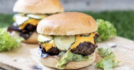 Beef burger with dill sauce, pickles and cheese – The Irish Times Pickle Burger, Pickles And Cheese, Cooking Over Fire, Irish Beef, Fish Burger, Small Cucumber, Food Scientist, Dill Sauce, Burger Sauce