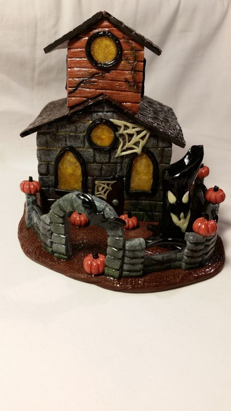 Polymer Clay Halloween Haunted House Tea Light Candle Holder, Handmade, Home Decor, Holiday Decor by OriansCreations on Etsy https://www.etsy.com/listing/477074951/polymer-clay-halloween-haunted-house-tea Halloween Village Display, Haunted House Diy, Floral Bedspread, Casa Halloween, Halloween Clay, Haunted Dollhouse, Adornos Halloween, Halloween Miniatures, Spooky House