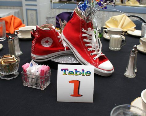 Sneaker centerpiece for a Bar Bat Mitzvah - simple and cute! Converse Centerpiece, Sneaker Centerpieces Table Decorations, Converse Party Theme Ideas, Sneakers Centerpiece, Sneaker Ball Table Centerpieces, Sneaker Party Decorations, Sneaker Centerpieces, Sneaker Centerpiece Ideas, Sneaker Ball Centerpiece Ideas