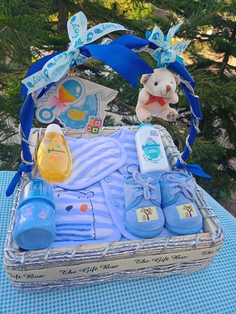 It's a boy themed gift hamper ideas Newborn Hamper Ideas, Newborn Baby Gift Hamper, Baby Boy Gifts Basket, Gift Basket For Baby Boy, Baby Boy Gift Ideas Newborn, Baby Boy Hamper Ideas, Baby Boy Gift Wrapping Ideas, Baby Hampers Ideas Gift, Baby Boy Basket Gift Ideas