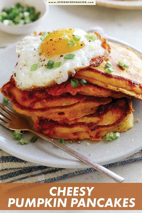 This Cheesy Pumpkin Pancakes Recipe is the perfect cozy fall breakfast recipe. These pancakes are easy to make, light and fluffy, and filled with all the cheesy, pumpkin goodness! Top with a fried egg for an extra decadent meal! #fall #pancake #pumpkin Pumpkin Pancakes Recipe, Green Onion Pancake, Onion Pancake, Fall Recipes Breakfast, Freeze Pancakes, Spoon Fork Bacon, Pumpkin Pancake Recipe, Veg Soup, Baked Pancakes