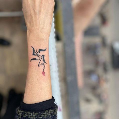 Top 50 Forearm Tattoos for Men: Ideas and Inspiration [2023] Small Shiva Tattoos For Men, Om Tatoos Design For Women, Om Tattoo Design Women Hand, Spiritual Tattoos Meaningful For Women, Shiva Tattoo Design For Women, Tettu Design Tattoo, Cool Wrist Tattoos For Women, Swastik Design Tattoo, Om Tattoo Design Women