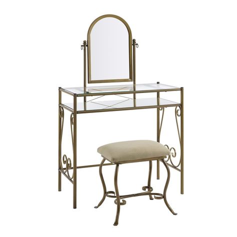 Elegant scroll details in an antique gold finish create this light and airy makeup vanity. The large mirror swivels to be at just the right angle for you. A glass top and mirrored shelf provides ample storage and display space for accessories and makeup, everything organized but also in view. Matching stool is upholstered in a beige linen fabric that tucks easily away when not in use. Perfect for placing in a bedroom or dressing area. Nice open surface can also serve as a desk. Linon 31.8-in Ant Metal Vanity, Bedroom Makeup Vanity, Upholstered Stool, Vinyl Record Storage, Record Storage, Mirror With Shelf, Traditional Bedroom, Table Stool, Vanity Table