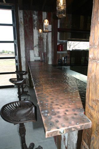 43 Super Cool Bar Top Ideas to Realize Bar Top Design, Tractor Bar, Metal Bar Top, Tractor Bar Stools, Copper Bar Top, Tractor Seat Bar Stools, Bar En Plein Air, Barn Bar, Wood Bar Top