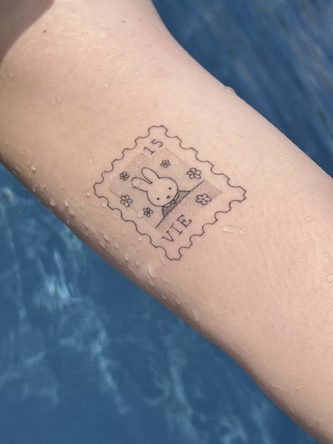 miffy stamp tattoo Bunny Stamp Tattoo, Miffy Tattoo Design, Smiski Tattoo, New York Stamp Tattoo, Miffy Stamp, Miffy Tattoo, Stamp Tattoo Ideas, Patch Work Tattoos, Cute Tattoos Ideas